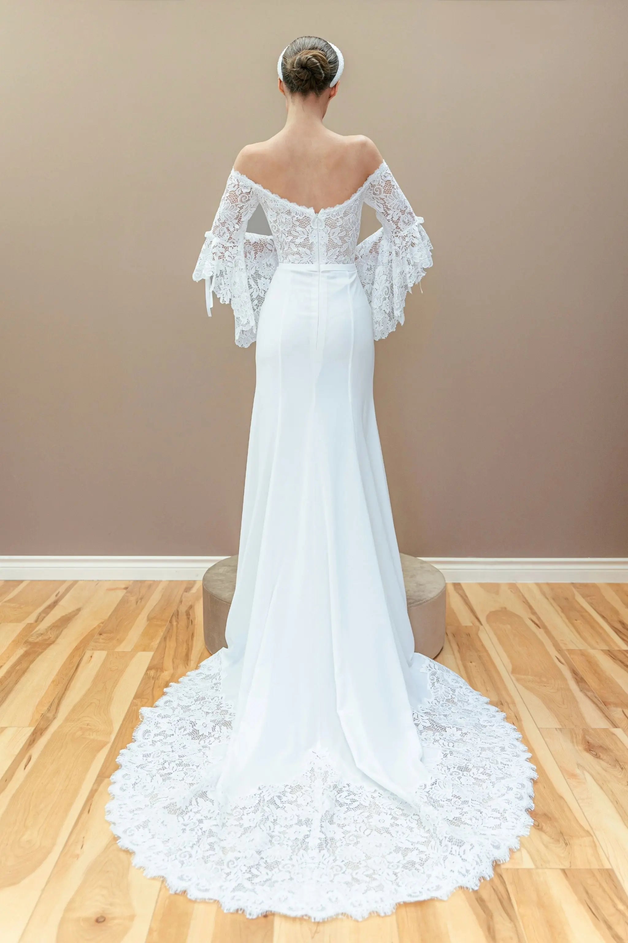 white off-the-shoulder wedding dress