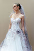 Close-up of the sweetheart neckline and structured corset bodice on the floral appliqué wedding dress.
