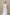 Sleek, fitted silhouette of the modern lace halter wedding gown for the reception.