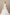 Peach bridal gown with lace corset, embroidered floral appliqué, and cathedral veil.