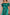Woman in an emerald green couture gown with a structured overskirt and off-the-shoulder neckline.