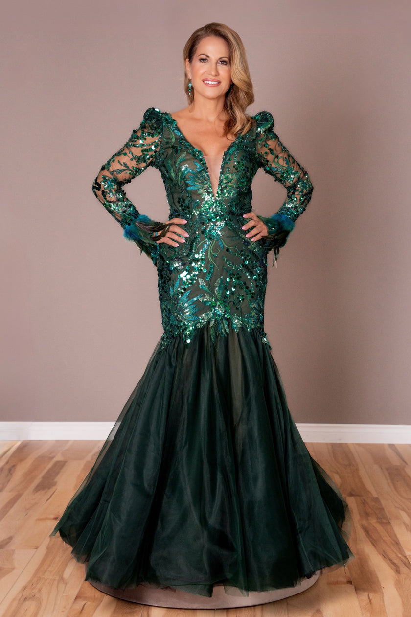Front view of emerald green sequin mermaid gown with deep V illusion neckline