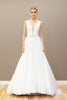 Modern A-line wedding gown with a deep V-neckline and a sparkling beaded waistband.