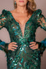 Green sequin dress with long sleeves and feather details