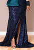 Navy sequin gown with a high slit.