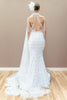 Back view of the modern couture wedding gown, showcasing the low back and fitted silhouette with fringe detailing.