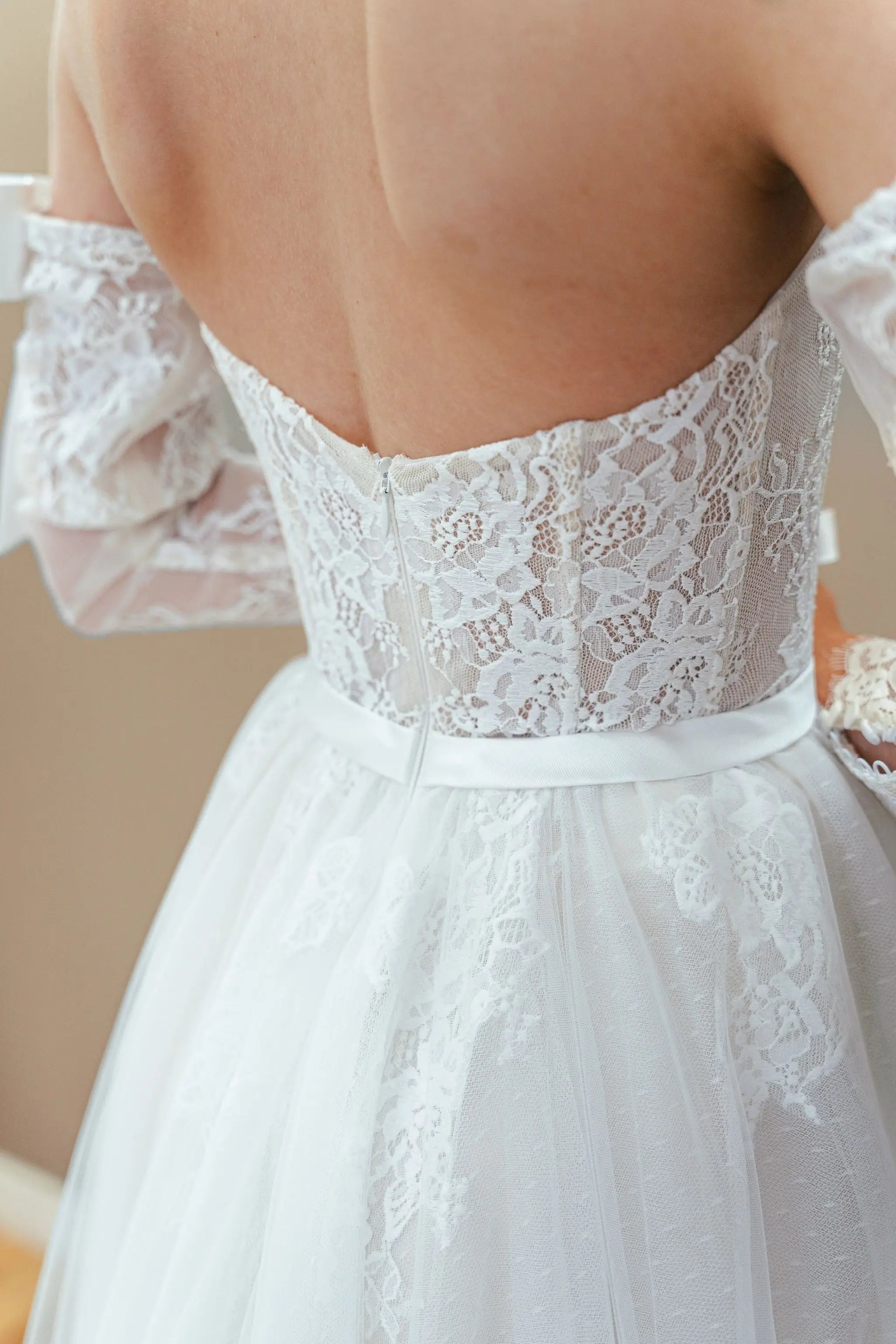back view of a white bridal gown